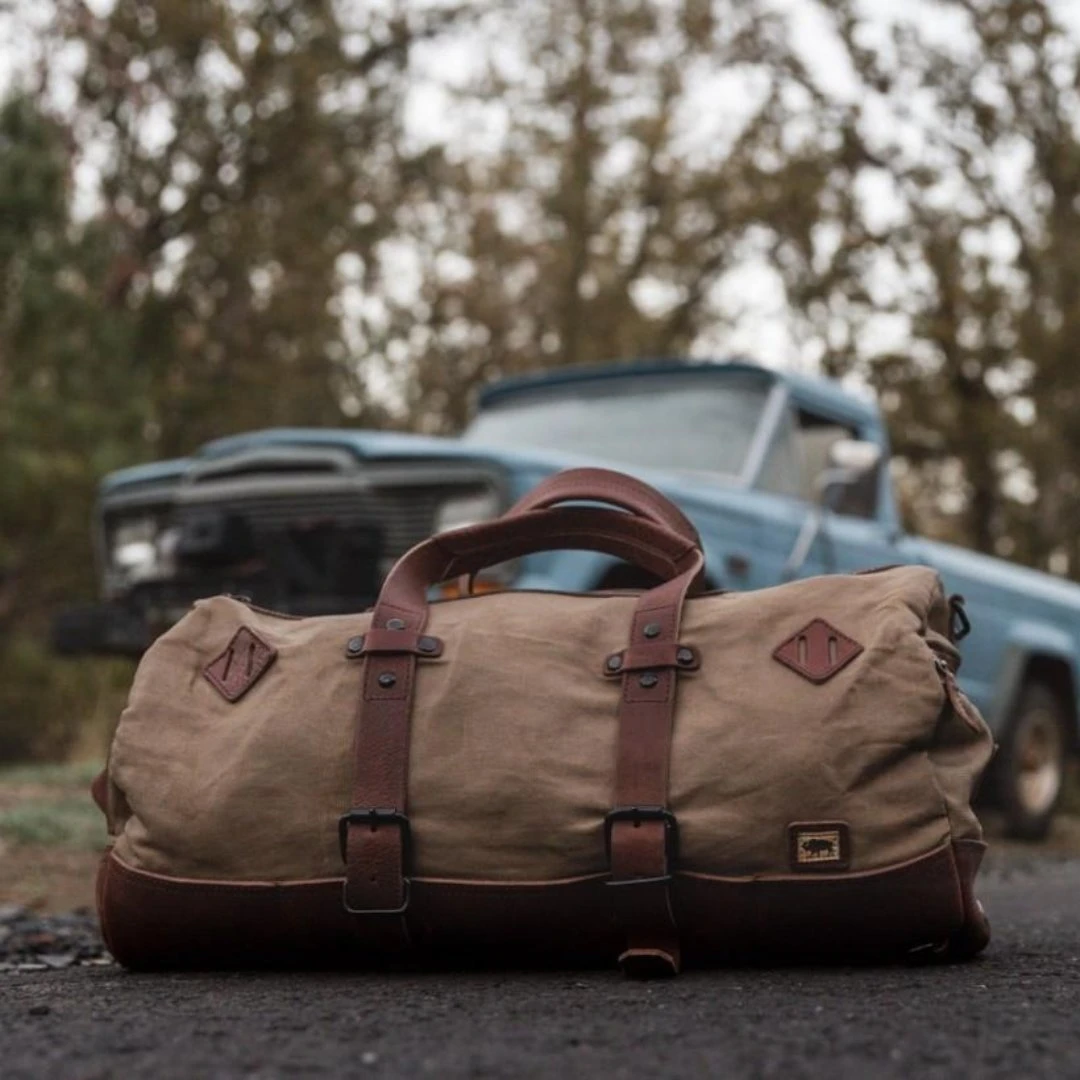 Buffalo Jackson Trading Co. Dakota Waxed Canvas Duffle Bag/Backpack | Field Khaki W/ Chestnut Brown Leather 14 Buffalo Jackson Trading Co. Dakota Waxed Canvas Duffle Bag/Backpack | Field Khaki W/ Chestnut Brown Leather